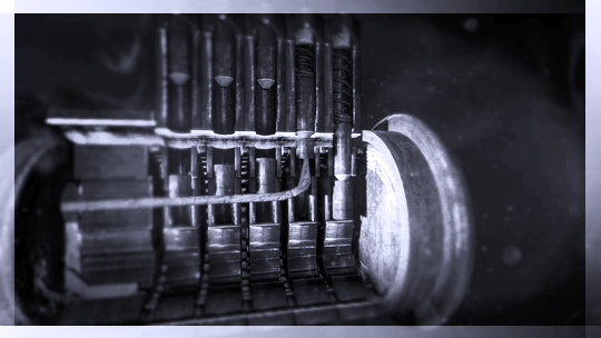 Vue interne d'un cylindre à goupilles : piles logées dans la bible du stator, goupille de pilotage et contre-goupille séparées par le plan de cisaillement entre rotor et stator.